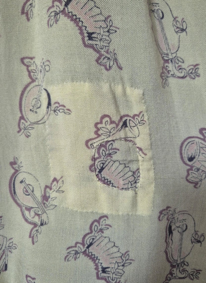 Make Do And Mend Full Apron with Musical Instruments Print